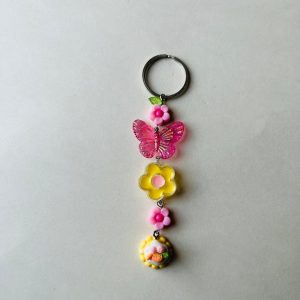 Handmade butterfly and flower keychain with colorful floral charms