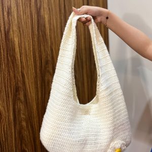 Handmade cream crochet shoulder bag with daisy flower detail